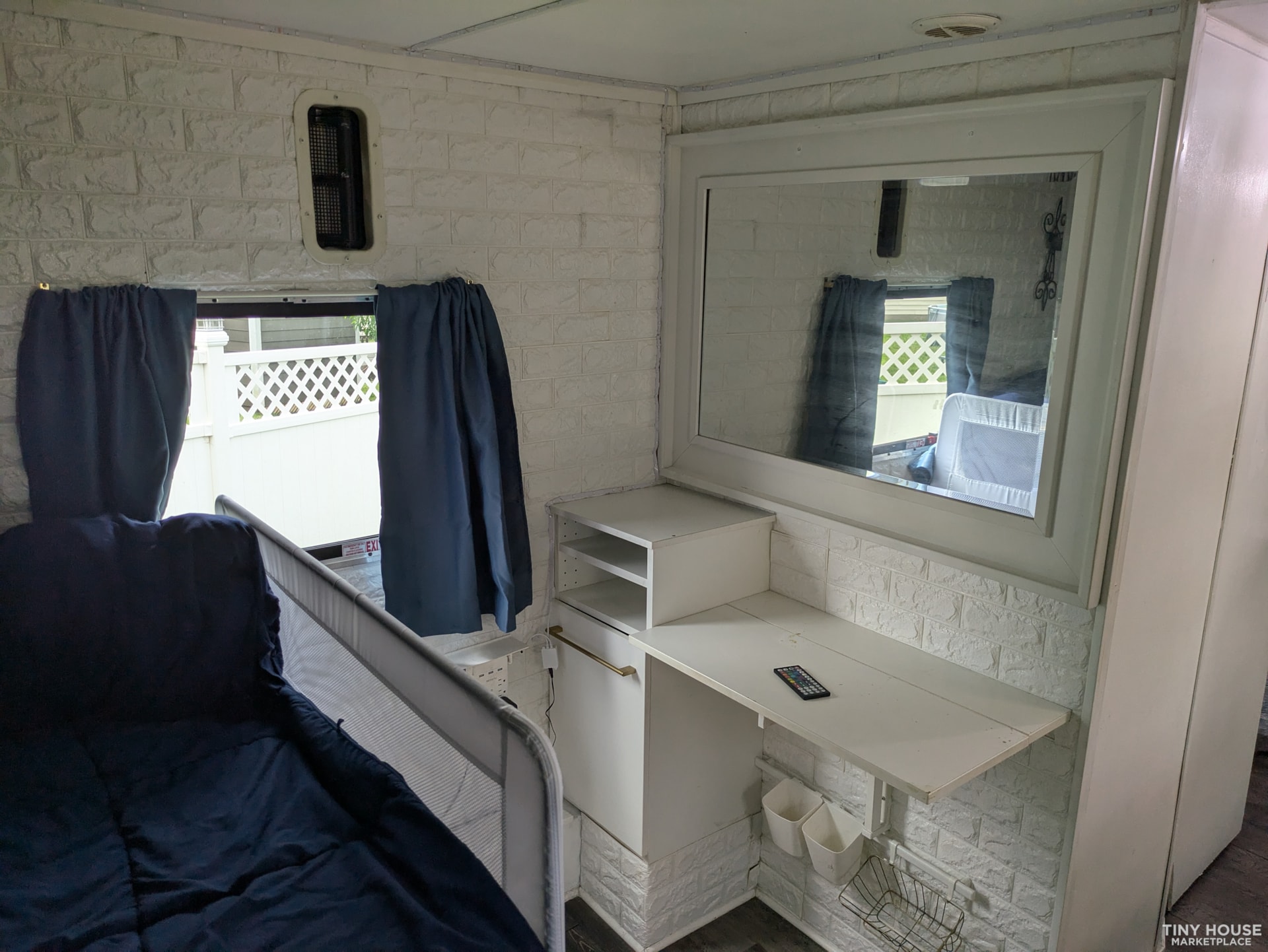 1BR 1BA Tiny Home on Wheels - Converted Toy Hauler trailer with kitchen - Image 3 Thumbnail