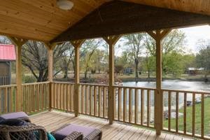 Fully Furnished Tiny House with Wrap Around Porch — Move or Leave in Place - Image 1 Thumbnail