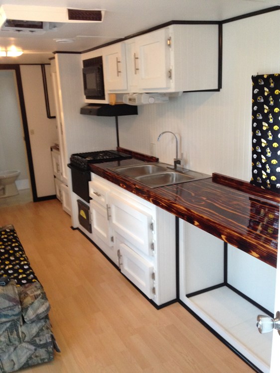 Remodeled 2006 Camper Inspired by the tiny house movement, includes Custom Fire-Torched Countertops - Image 1 Thumbnail