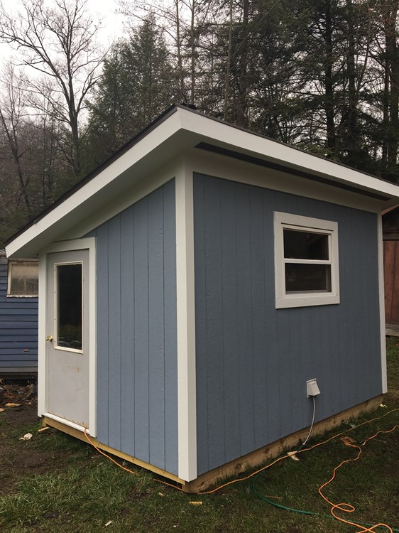 Rustic tiny house on skids
