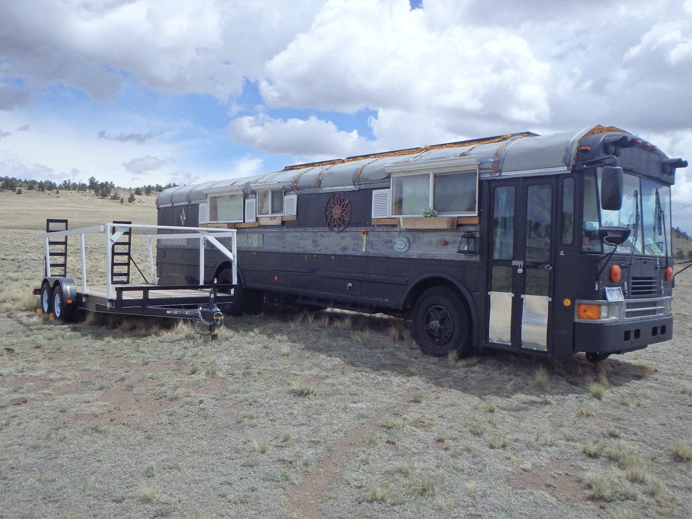Bus RV Tiny Home plus Car Trailer