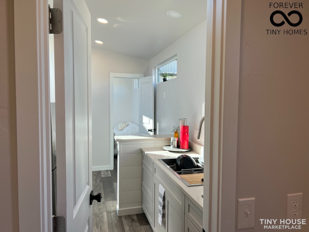 New Forever 32' Suite 2022 Model with lower bedroom, upgraded fixtures & More! - Image 2 Thumbnail