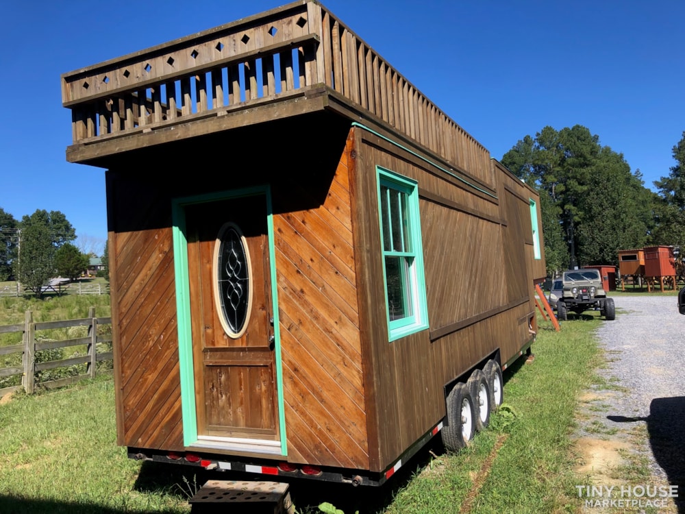28 foot Gooseneck with 8 foot Platform over the neck. Total length is 36 feet.