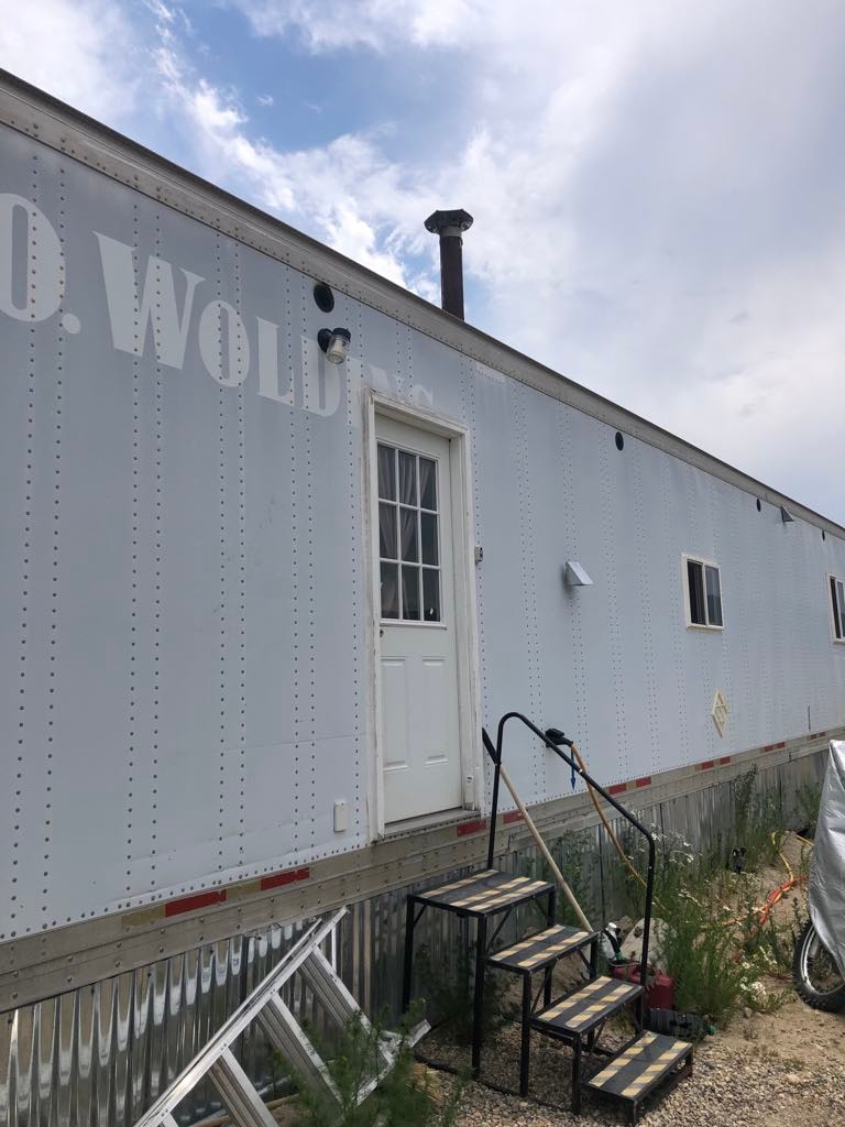 53'ft Converted Box Trailer Tiny Home 1Bed 1 Bath with Wood Stove, Travel Ready! - Image 1 Thumbnail