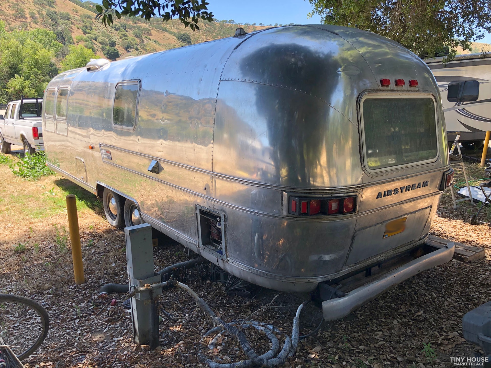 Cozy Vintage Tiny Home 1974 Airstream Sovereign - Image 2 Thumbnail