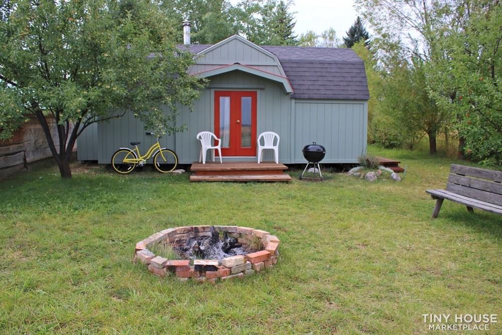 Backside of Tetons "cottage" on 1 acre in Victor, ID with several out buildings