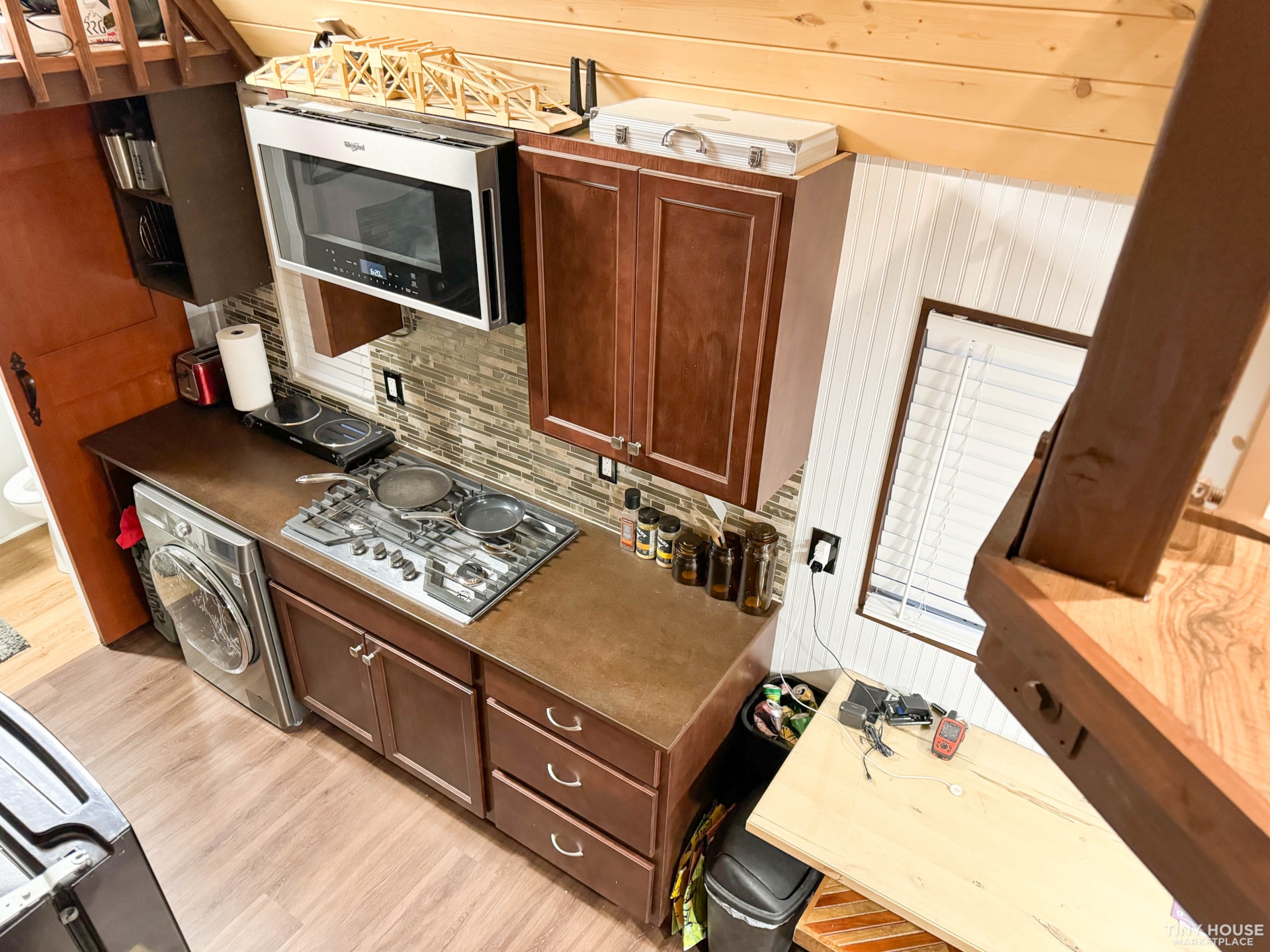 Beautiful 24ft Dual Loft Tiny House - Stairs, Full size stove, W/D, and more! - Image 4 Thumbnail