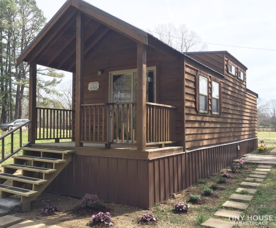 Cedar-sided park model tiny home stationed on one acre in rural West Tenn.
