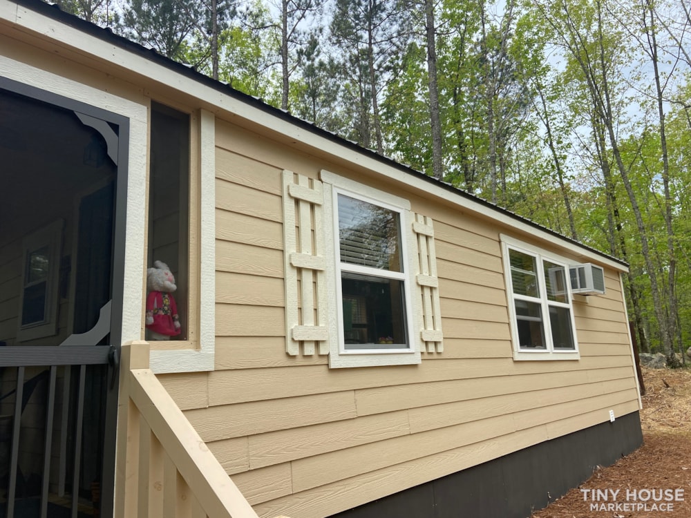 Adorable Tiny home cabin on 3/4 acre tucked in the woods in a gorgeous community - Image 2 Thumbnail
