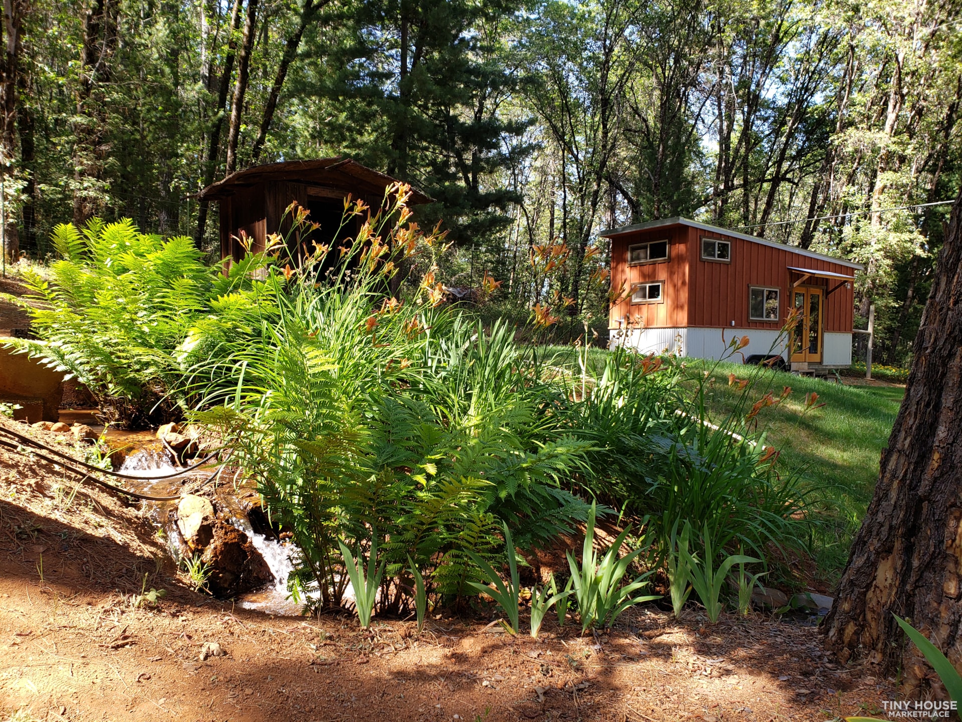 Custom wood paneled tiny house on trailer - Image 2 Thumbnail