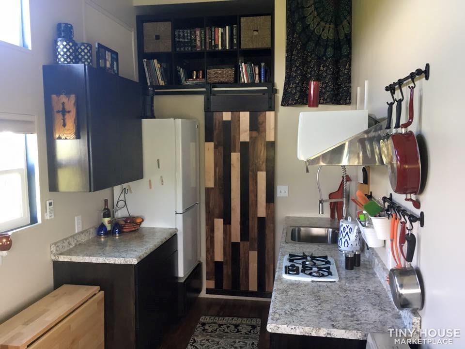 Beautiful custom 8x33 home with stairs to Master BR and tons of storage - Image 2 Thumbnail