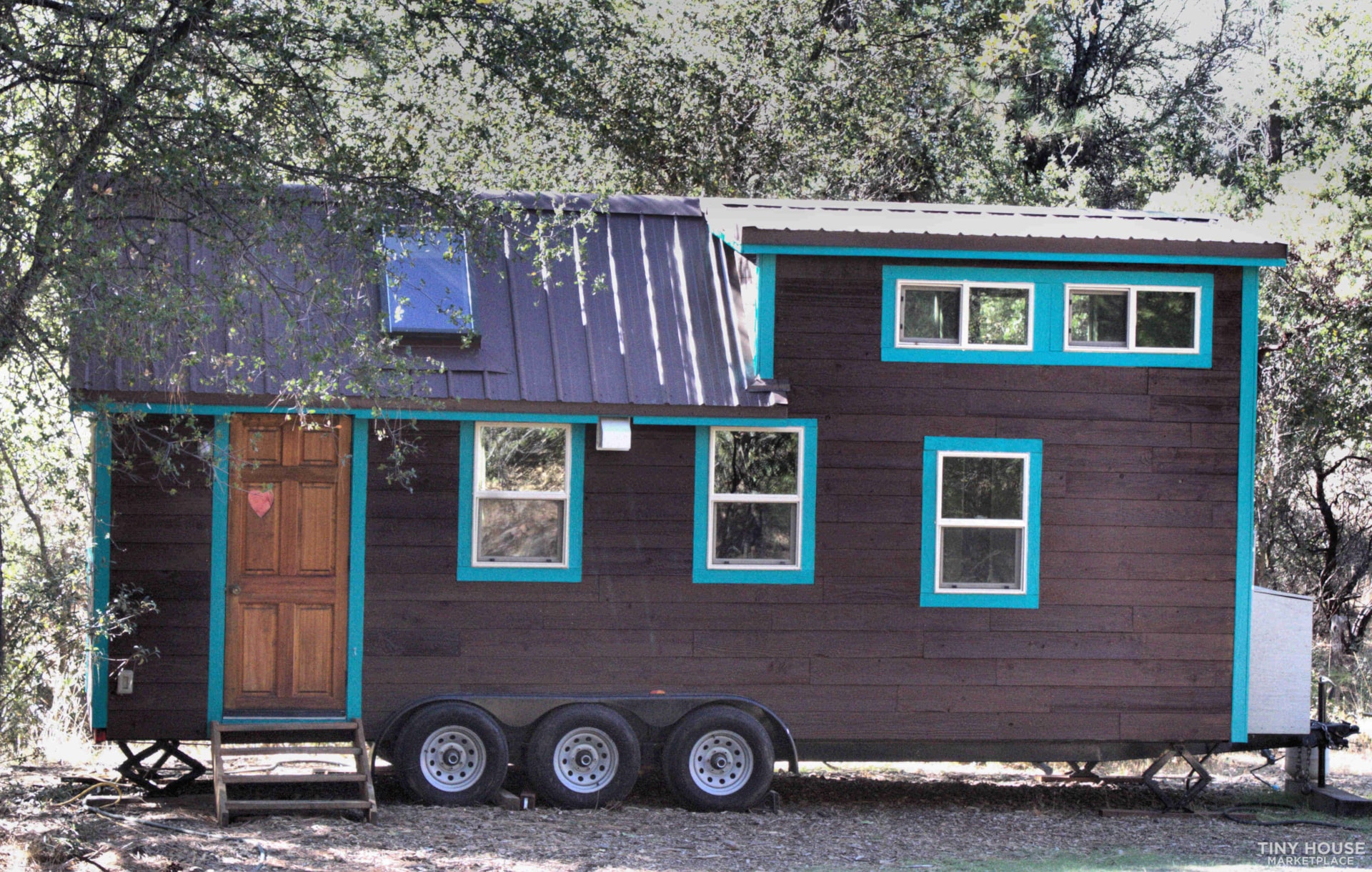 Live large in this custom tiny home. - Image 1 Thumbnail