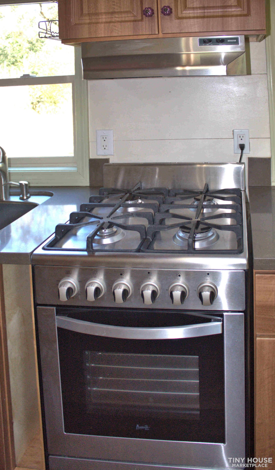 Live large in this custom tiny home. - Image 4 Thumbnail