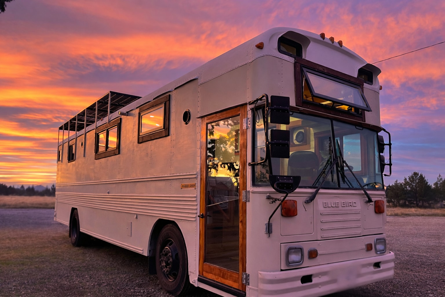 Off-Grid Luxury Skoolie | 20" Roof Raise | 2,700W Solar | Cummins Diesel - Image 2 Thumbnail