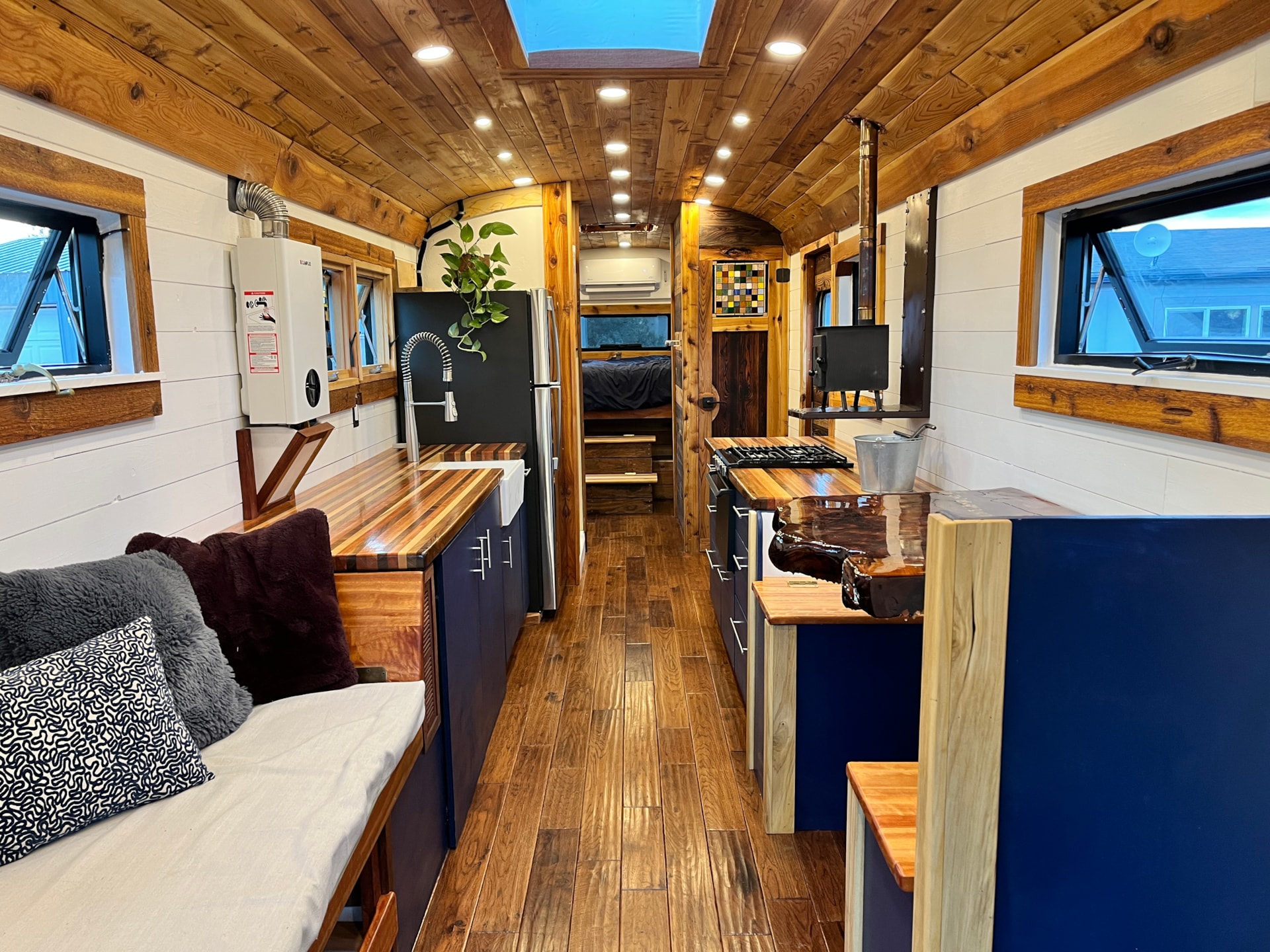 Off-Grid Luxury Skoolie | 20" Roof Raise | 2,700W Solar | Cummins Diesel - Image 3 Thumbnail