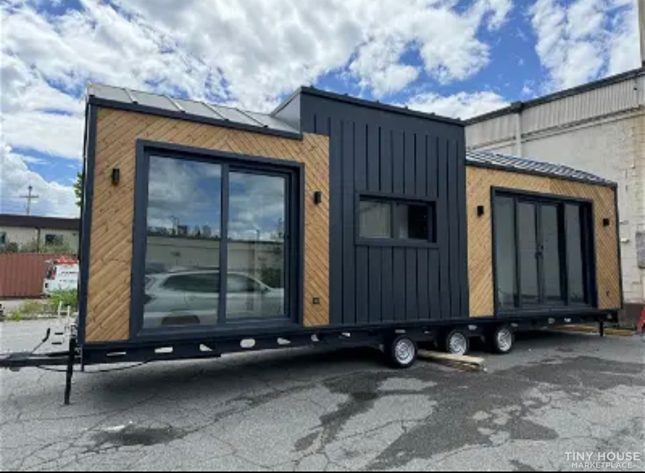 Ruby model. A 32' Steel Frame Tiny House with Downstairs 