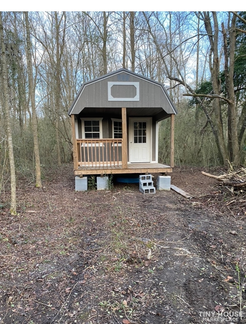 Rustic tiny cabin 12x28