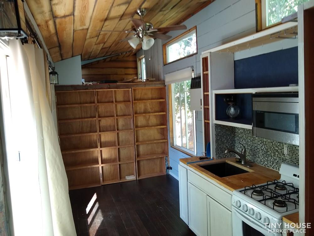 Tiny House For Sale Secret Bookshelf Door