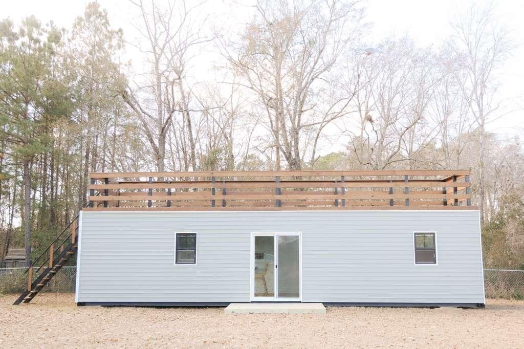 Tiny house with a deck on top - Image 1 Thumbnail