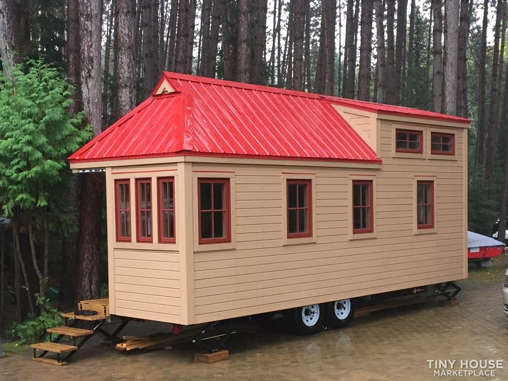 Tumbleweed Cypress 24 design on low-wider trailer