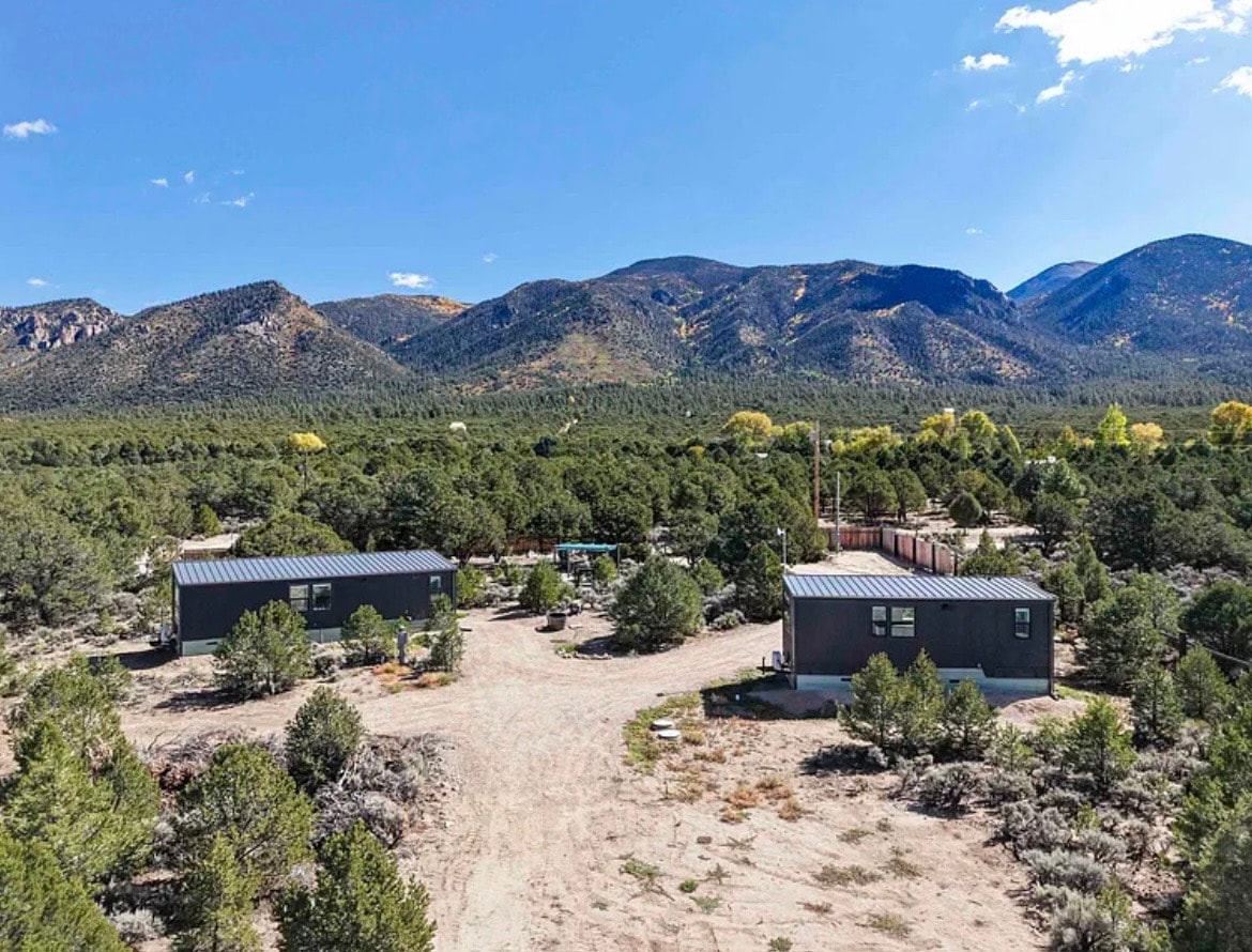 Two custom built tiny homes on just under 2 acres with spectacular views