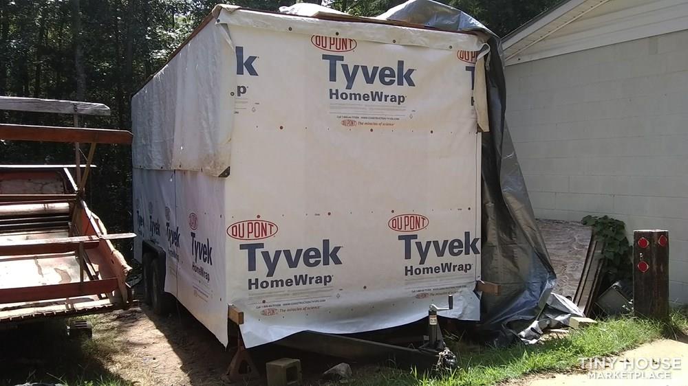 Unfinished Tiny Home Builders custom trailer & shell for half the material cost
