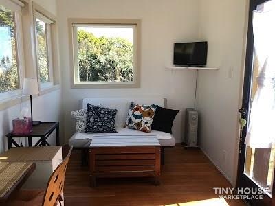 Unique, bright tiny house on wheels for sale